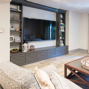 Family Room with Custom Book Shelves in West Chester Basement