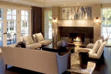 Inspiration for a mid-sized transitional open concept dark wood floor home theater remodel in Orlando with beige walls