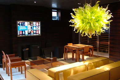 Example of an enclosed carpeted home theater design in Toronto with red walls