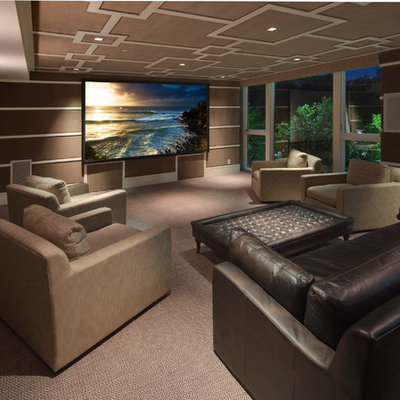 Inspiration for a mid-sized timeless enclosed carpeted and beige floor home theater remodel in Los Angeles with a projector screen and brown walls
