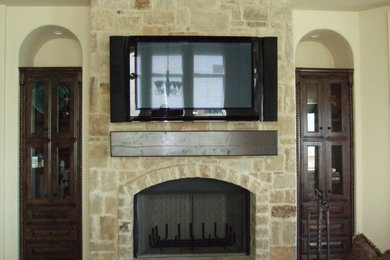 Home theater - traditional home theater idea in Austin