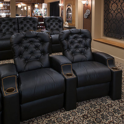 Example of a mid-sized classic enclosed carpeted and multicolored floor home theater design in New York with beige walls and a projector screen
