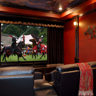 Example of a large classic enclosed carpeted and multicolored floor home theater design in Austin with red walls and a projector screen