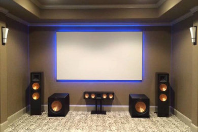 Home theater - home theater idea in Dallas with beige walls