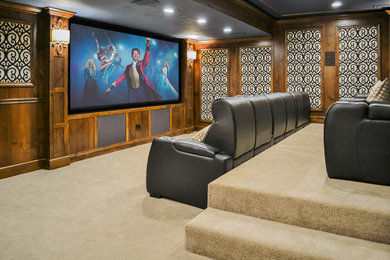 Home theater - traditional carpeted and beige floor home theater idea in Other