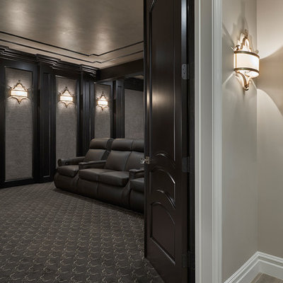 Huge transitional enclosed carpeted home theater photo in Detroit with brown walls and a projector screen