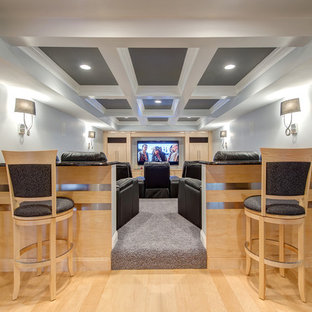 Example of a classic home theater design in St Louis with gray walls
