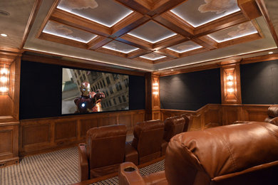 Imagen de cine en casa cerrado tradicional grande con moqueta, paredes verdes y televisor colgado en la pared