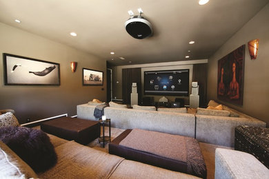 Home theater - large traditional enclosed carpeted and beige floor home theater idea in Minneapolis with beige walls and a projector screen