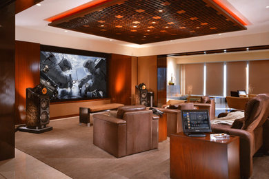 Marble floor home theater photo in Los Angeles with beige walls and a wall-mounted tv