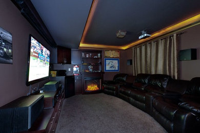Photo of a contemporary home cinema in Vancouver.