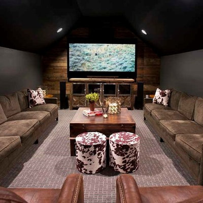 Home theater - mid-sized cottage enclosed carpeted home theater idea in Nashville with a media wall