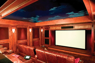 Home theater - large home theater idea in San Diego with a projector screen