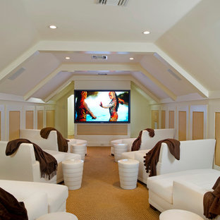 Large island style enclosed carpeted home theater photo in Orlando with white walls and a wall-mounted tv