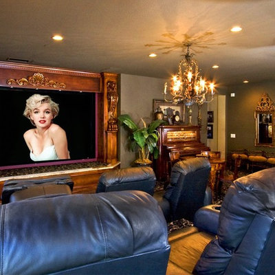 Mid-sized elegant enclosed carpeted and multicolored floor home theater photo in Orange County with red walls and a media wall
