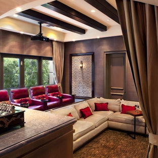 Mid-sized transitional open concept carpeted home theater photo with multicolored walls and a projector screen