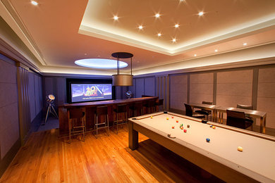 Example of a trendy home theater design in Houston