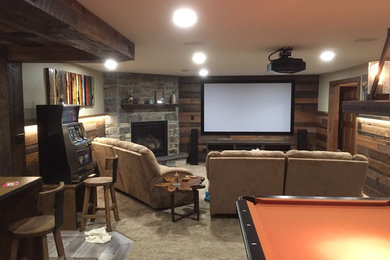 Example of a mountain style home theater design in Other