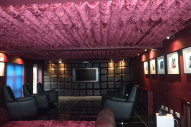 This is an example of a contemporary home cinema in Other.
