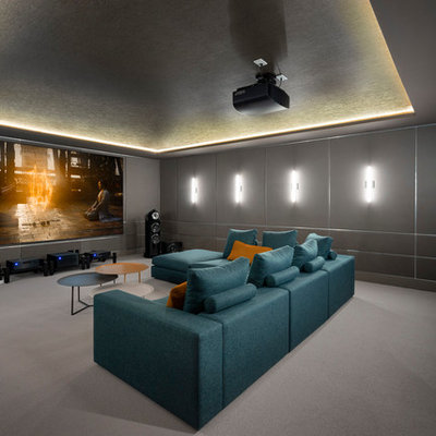 Inspiration for a contemporary carpeted and gray floor home theater remodel in Vancouver with gray walls