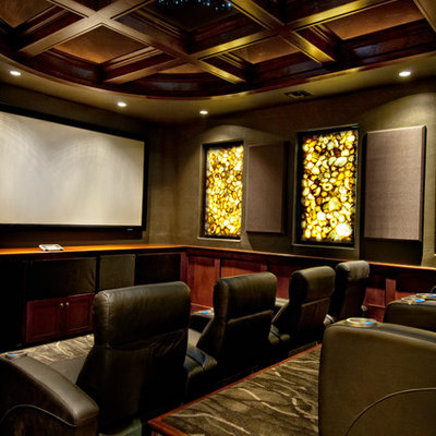 Example of a tuscan enclosed carpeted home theater design in Miami with brown walls and a projector screen