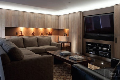 Example of a trendy home theater design in Boston