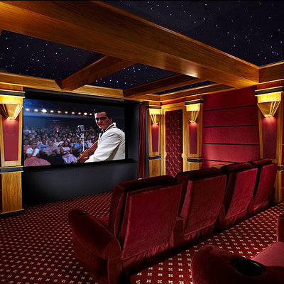 Large elegant enclosed carpeted and red floor home theater photo in New York with red walls and a projector screen