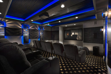 Example of a mid-sized minimalist enclosed carpeted home theater design in Salt Lake City with white walls and a projector screen