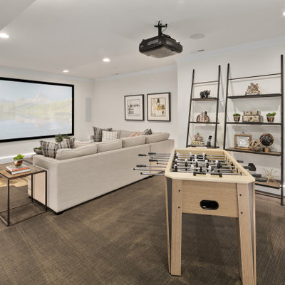 Inspiration for a large transitional open concept carpeted and gray floor home theater remodel in Seattle with white walls and a projector screen