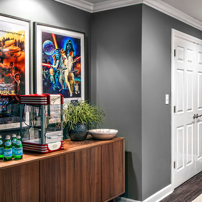 Example of a large trendy home theater design in Chicago with gray walls