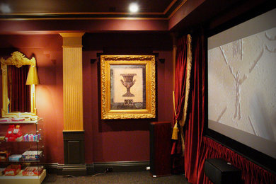 Inspiration for a carpeted home theater remodel in Toronto with red walls and a projector screen