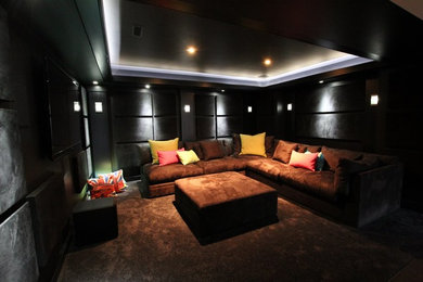 Example of a trendy home theater design in Toronto