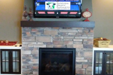 Tv mounting above fireplace