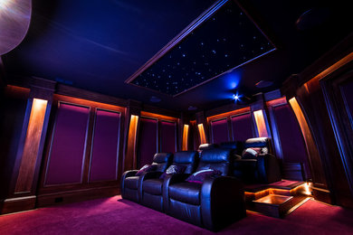 Example of a trendy home theater design in Charlotte