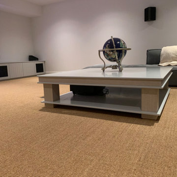 Custom made TV cabinetry and coffee table to house the projector