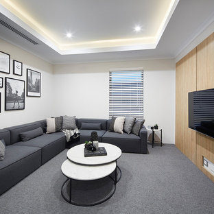 Inspiration for a contemporary enclosed home theatre in Perth with white walls, carpet, a wall-mounted tv and grey floor.