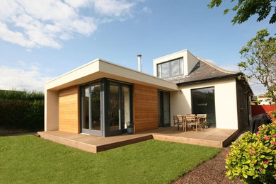 Design ideas for a contemporary house exterior in Edinburgh.