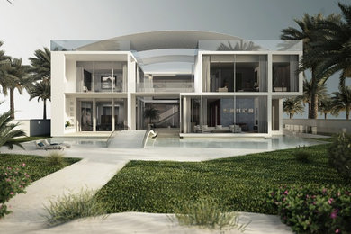 Immagine della villa bianca contemporanea a due piani di medie dimensioni con rivestimento in stucco e tetto piano