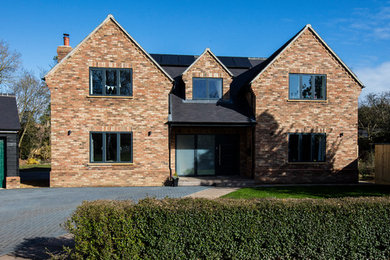Inspiration for a contemporary house exterior in Cambridgeshire.