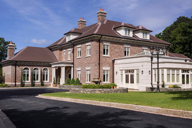 Photo of an expansive classic house exterior in Other.