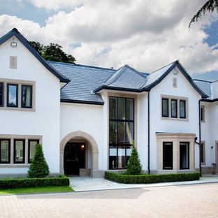 Design ideas for a white classic two floor detached house in Cheshire with a pitched roof.