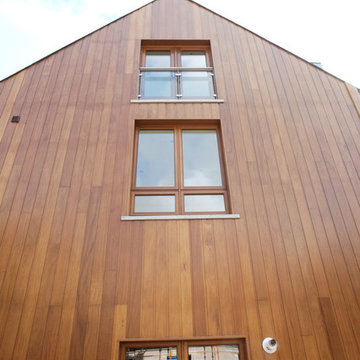 Collection of four contemporary Iroko timber clad modern family homes