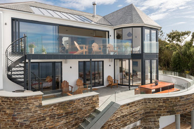 Inspiration for a beach style two floor house exterior in Cornwall.