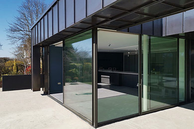 Photo of a contemporary house exterior in London with metal cladding.