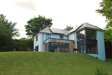 This is an example of a contemporary house exterior in Hampshire.