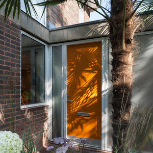 Inspiration för små 50 tals röda hus, med två våningar, tegel och platt tak