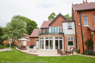 Design ideas for a traditional house exterior in Manchester.