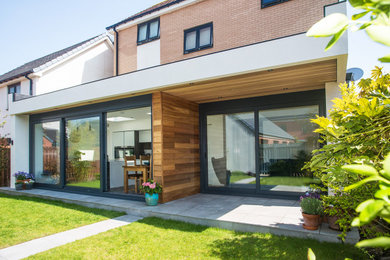 This is an example of a medium sized contemporary house exterior in Other.