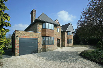 This is an example of a large contemporary house exterior in Other.