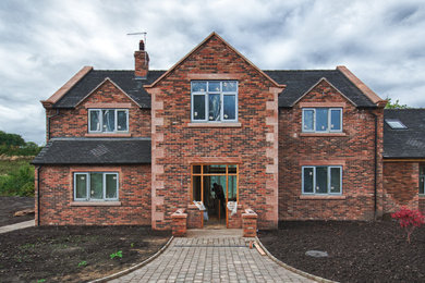 Design ideas for a traditional house exterior in West Midlands.